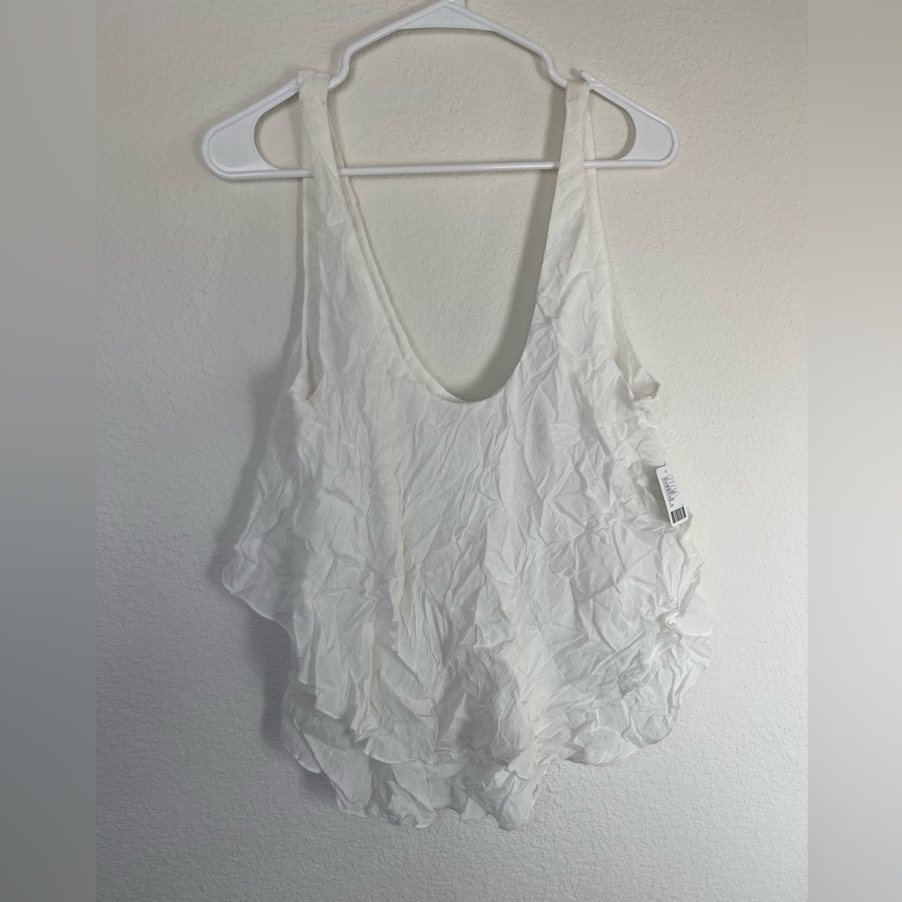 Free People Top
Color: White
Size M
BNWT